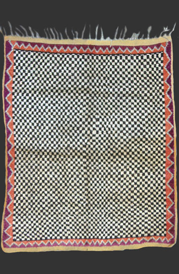 TM 136, highly rare pile-woven Ait Ouaouzguite checker board saddle rug, Jebel Siroua region, southern Morocco, 1920s, 145 x 120 cm (4' 9'' x 3' 11''), high resolution image + price on request







